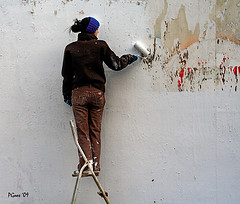 Painting the wall.